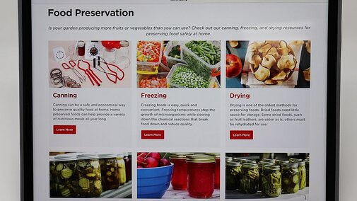 An iPad with the NE state food preservation webpage displayed.