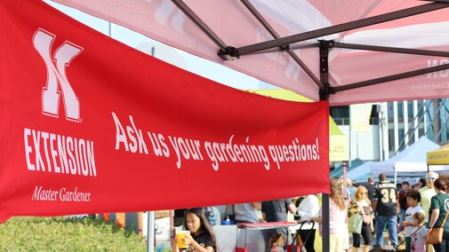 Ask the Master Gardeners banner at the Aksarben Farmers Market.